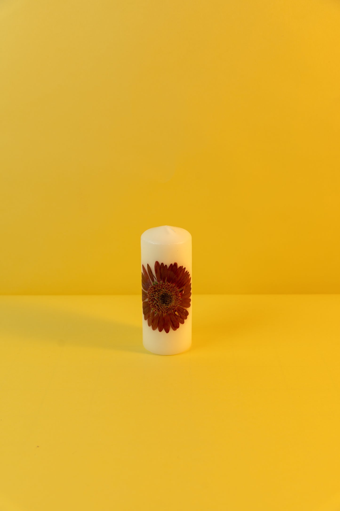 Pillar Candle decorated with dried flowers